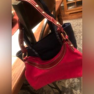 Little Girl pocketbooks. One Red. One Blue.